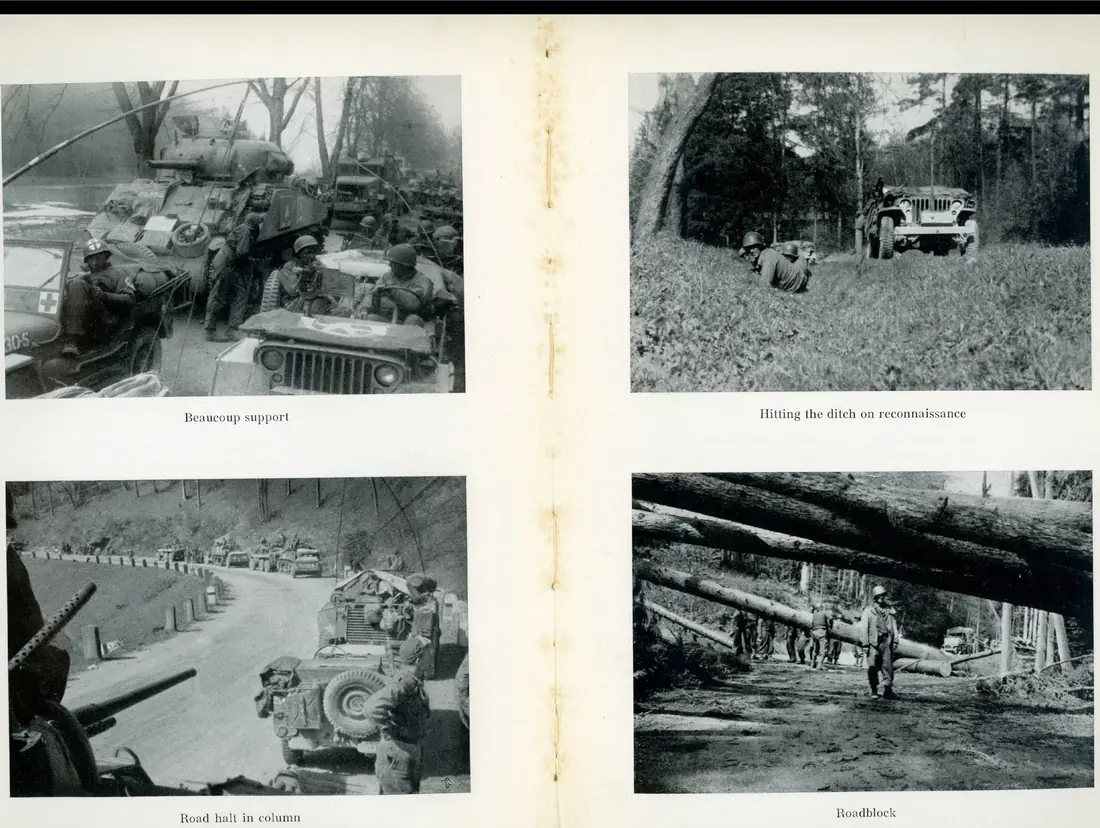 Tanks and jeeps loaded with troops moving up together