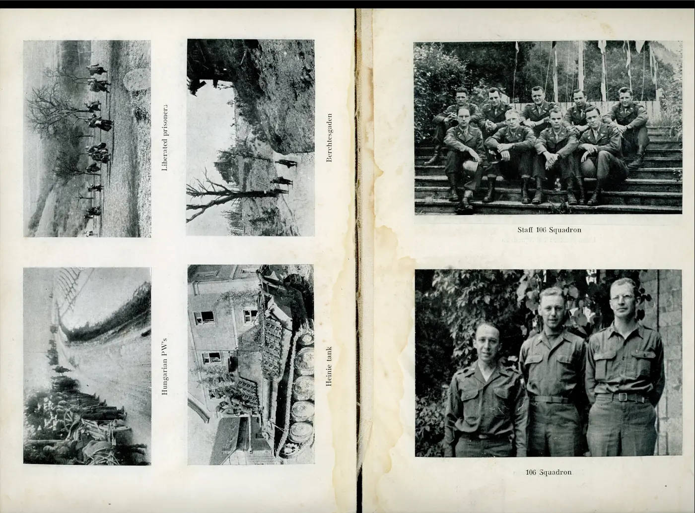 A long column of liberated prisoners marching along a road